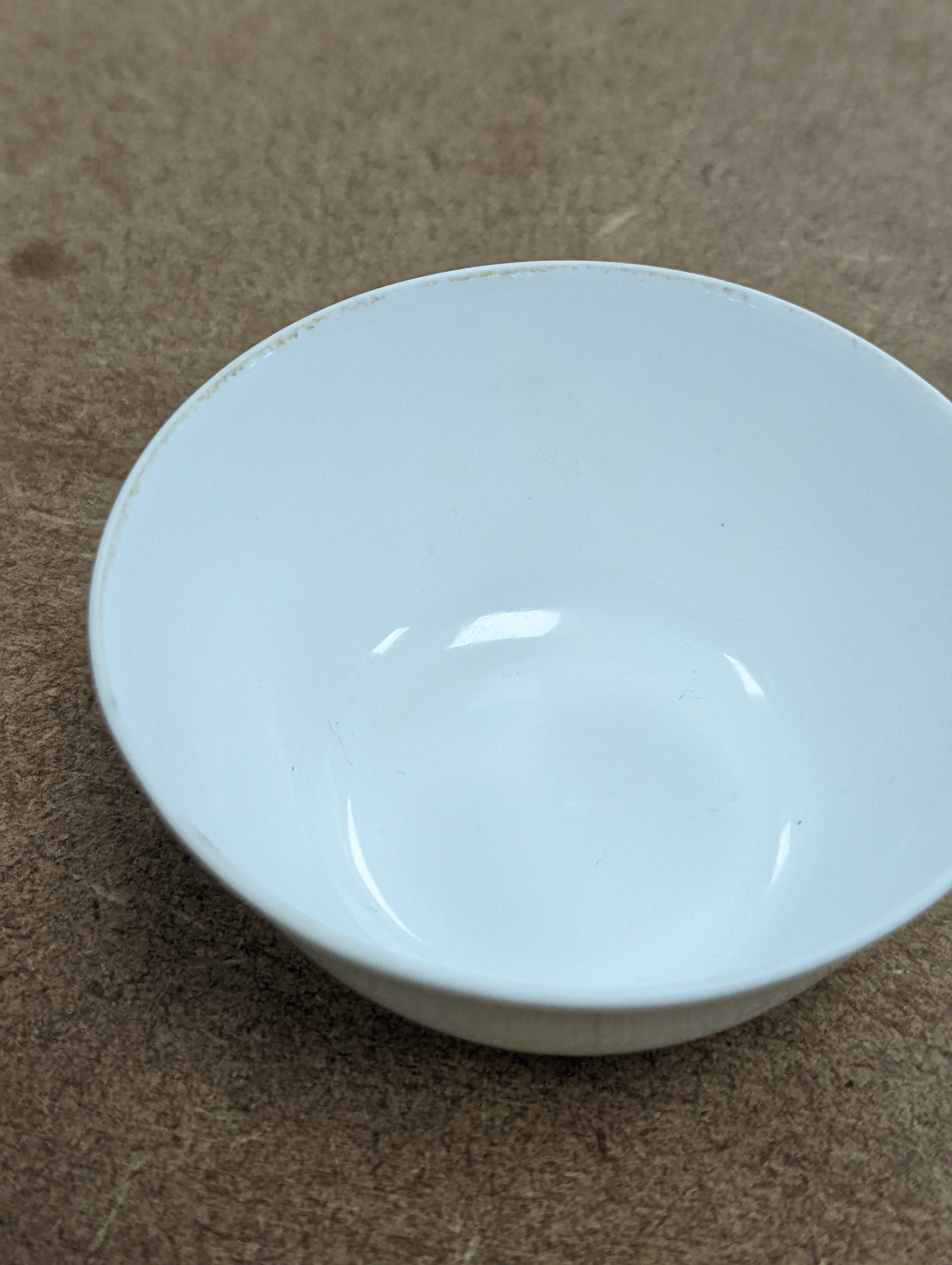 A Chinese white glazed water pot and a similar cup (2)